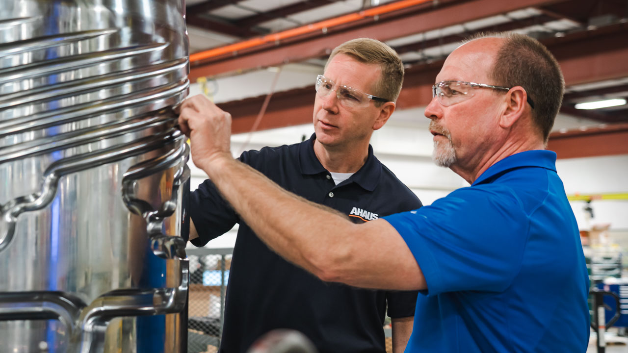 Two Ahaus employees working on project